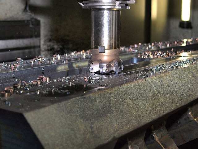 an industrial milling machine at work