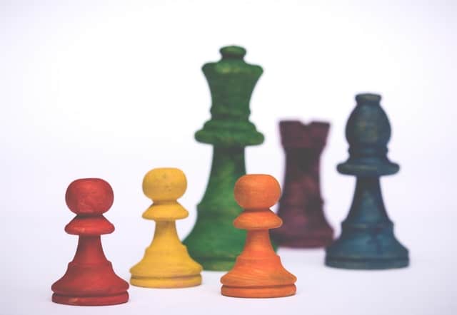 Multi coloured chess pieces