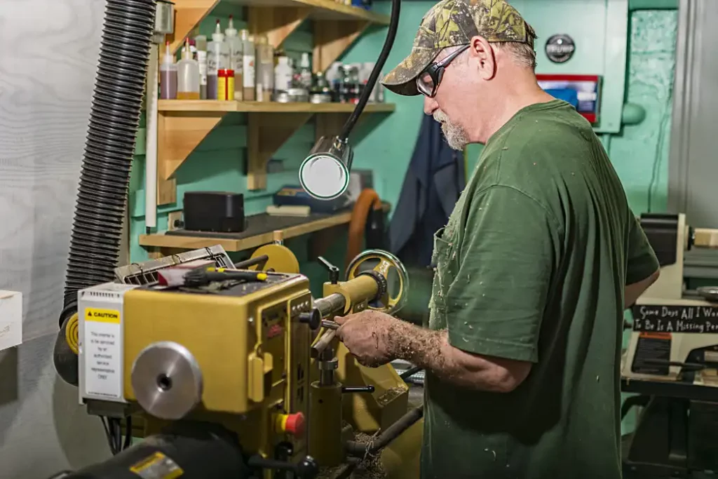 A-man-working-on-a-lathe
