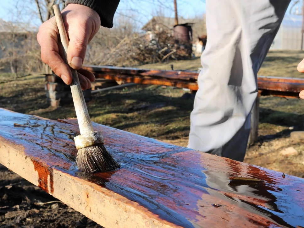 processing of wooden material with technical oil