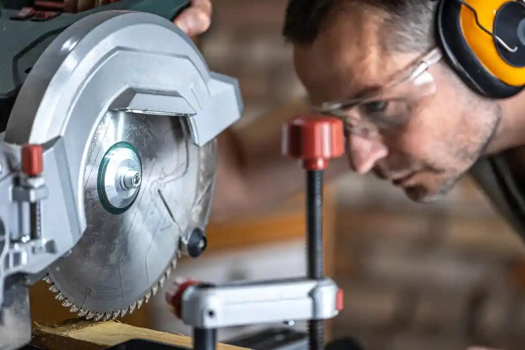 a-professional-carpenter-works-with-a-circular-saw-miter-saw