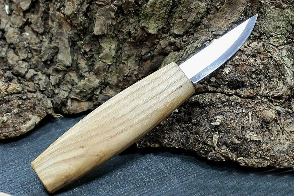  Beavercraft C1 Knife displayed on some wood 