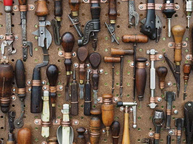 common hand tools laid on a surface